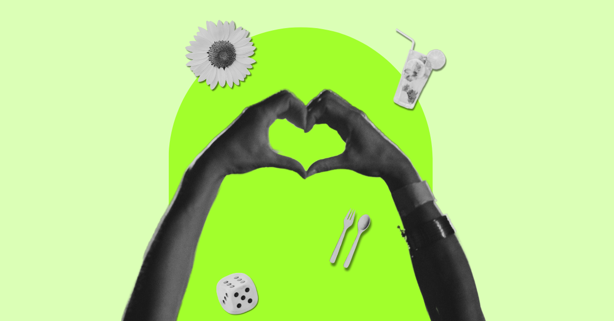 A hand gesture forming a heart surrounded by floating items - a sunflower, knife and fork, die and a mojito